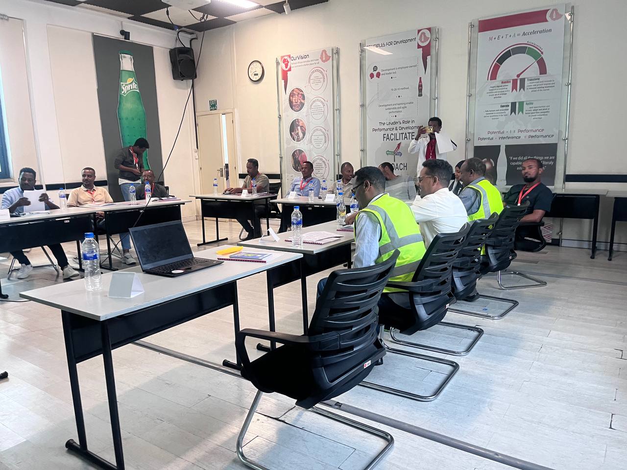 Art Edge Trading giving training for COCA COLA staff members.
